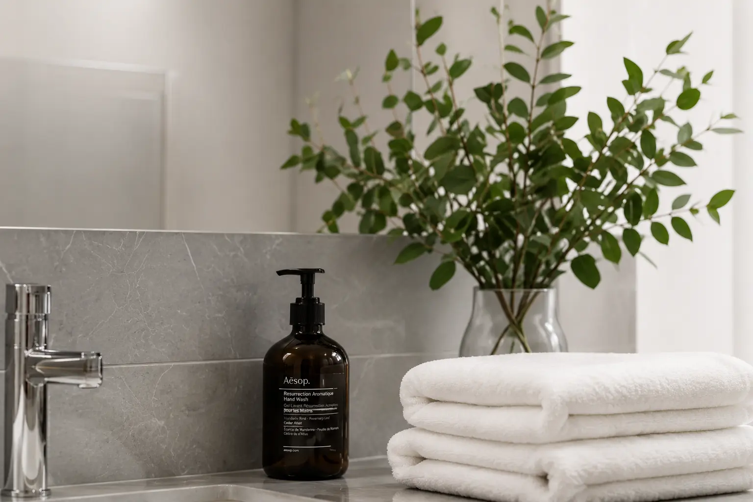 Fresh towels and carefully presented bathroom details